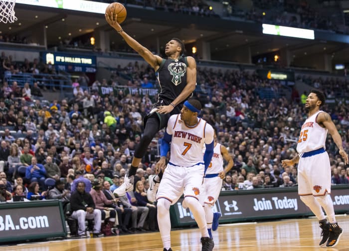Milwaukee Bucks forward Giannis Antetokounmpo (34) shoots over New York Knicks forward Carmelo Anthony (7)